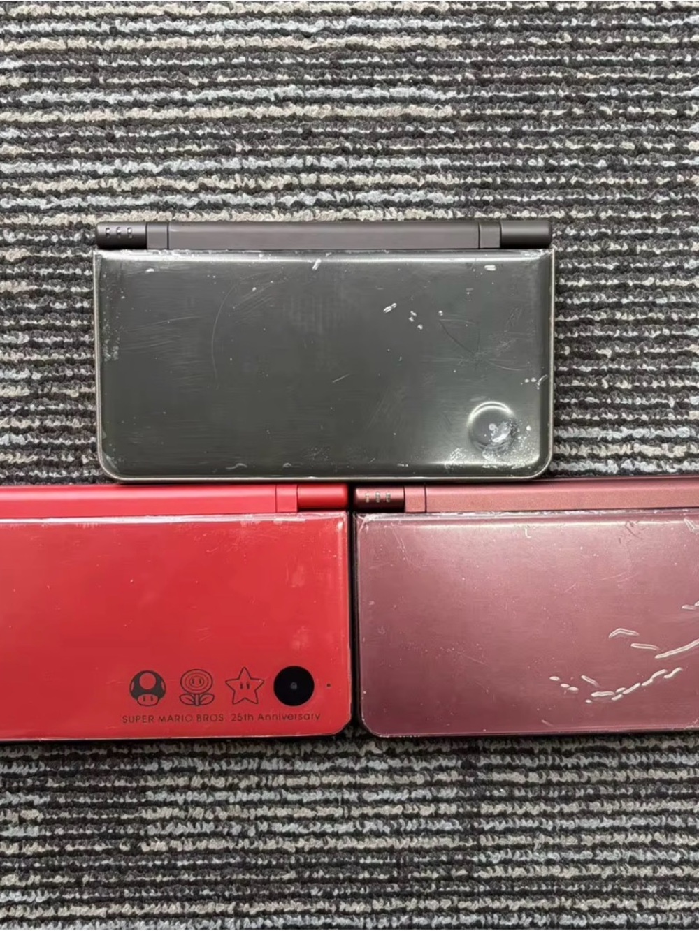 Refurbished Nintendo DSIXL
— Black, Red & Maroon Portable Consoles